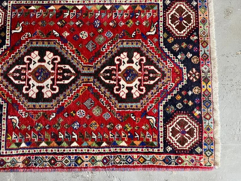 Tapis ancien à motifs